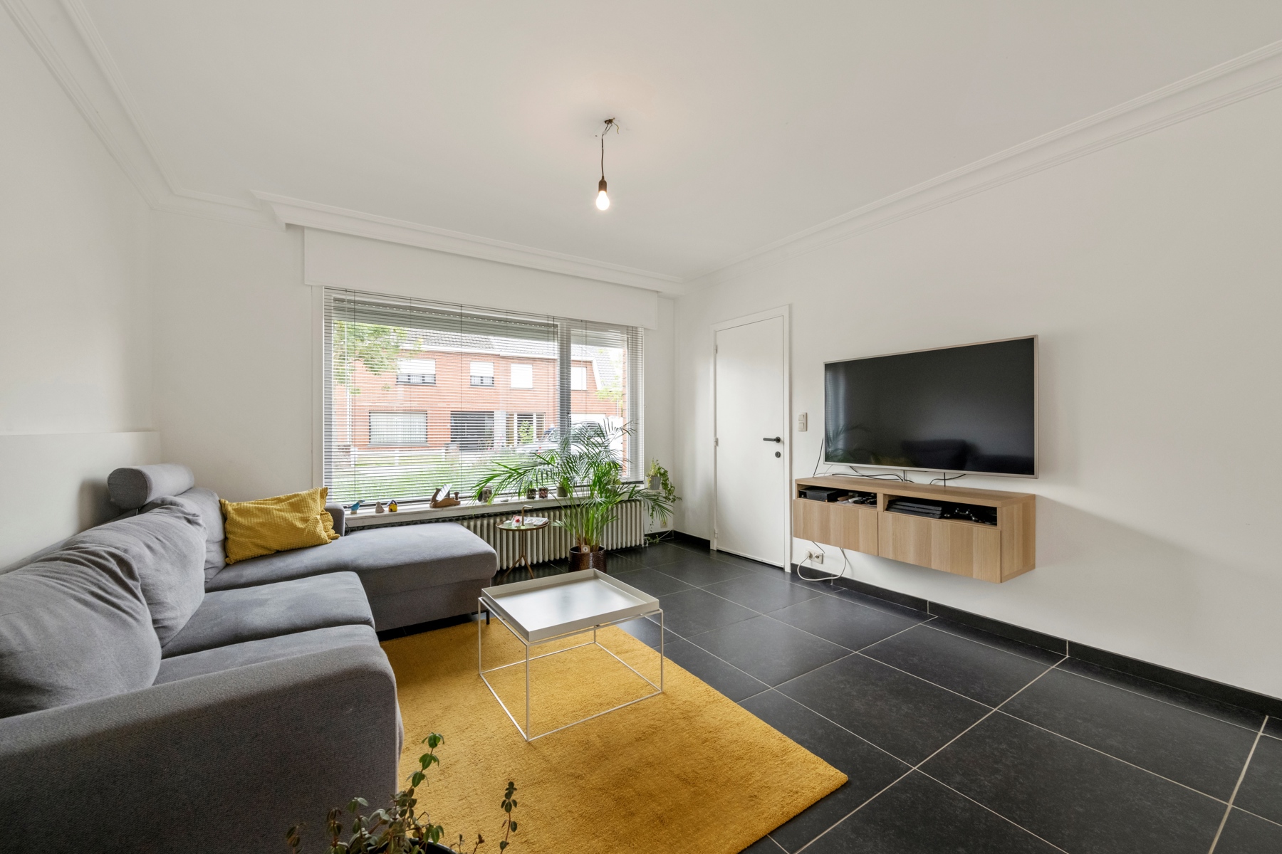 Rustig gelegen, lichtrijke & instapklare rijwoning te Brugge.
