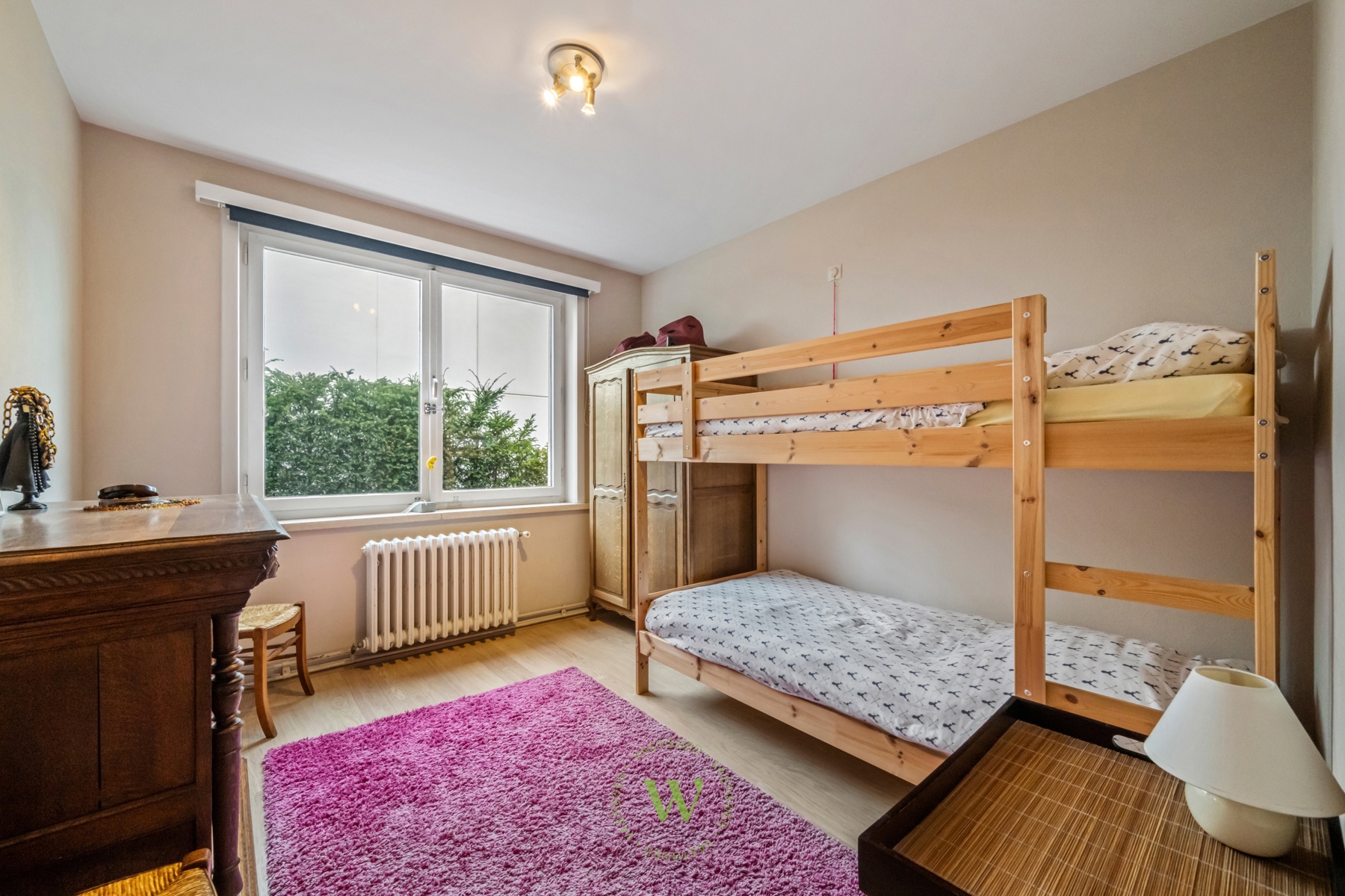 Lichtrijk 3-slaapkamerappartement met 2 garages