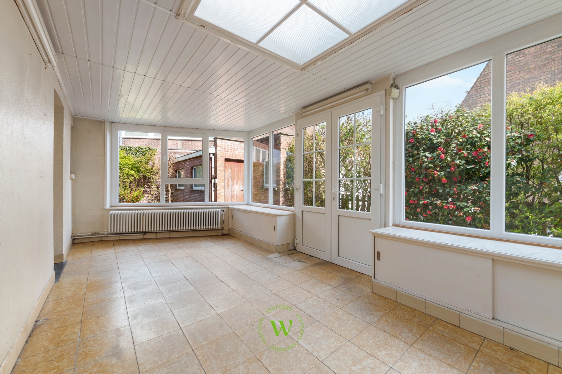 Verrassende en charmante halfopen bebouwing te Assebroek.