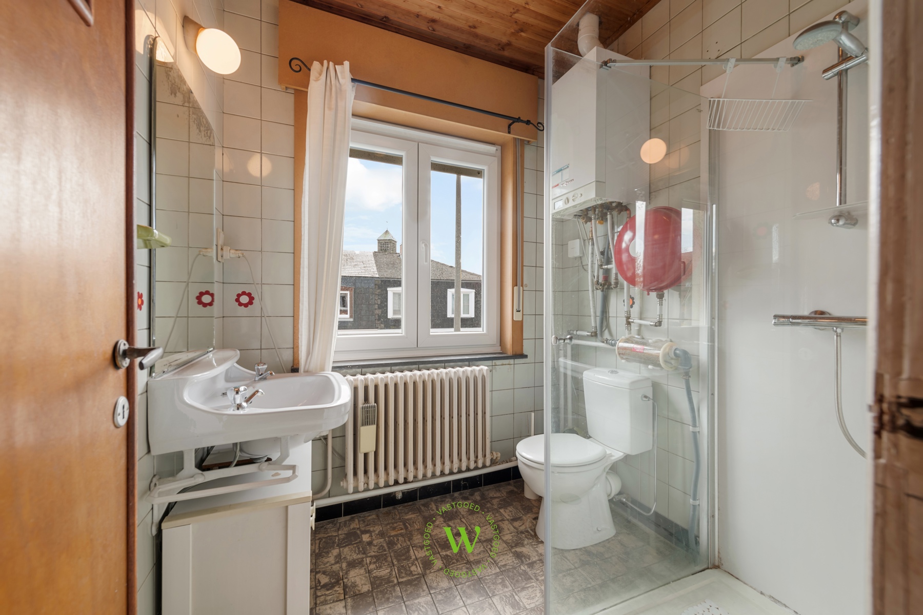 Verrassende en charmante halfopen bebouwing te Assebroek.