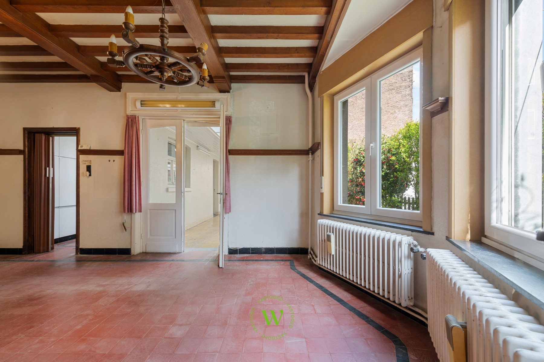 Verrassende en charmante halfopen bebouwing te Assebroek.