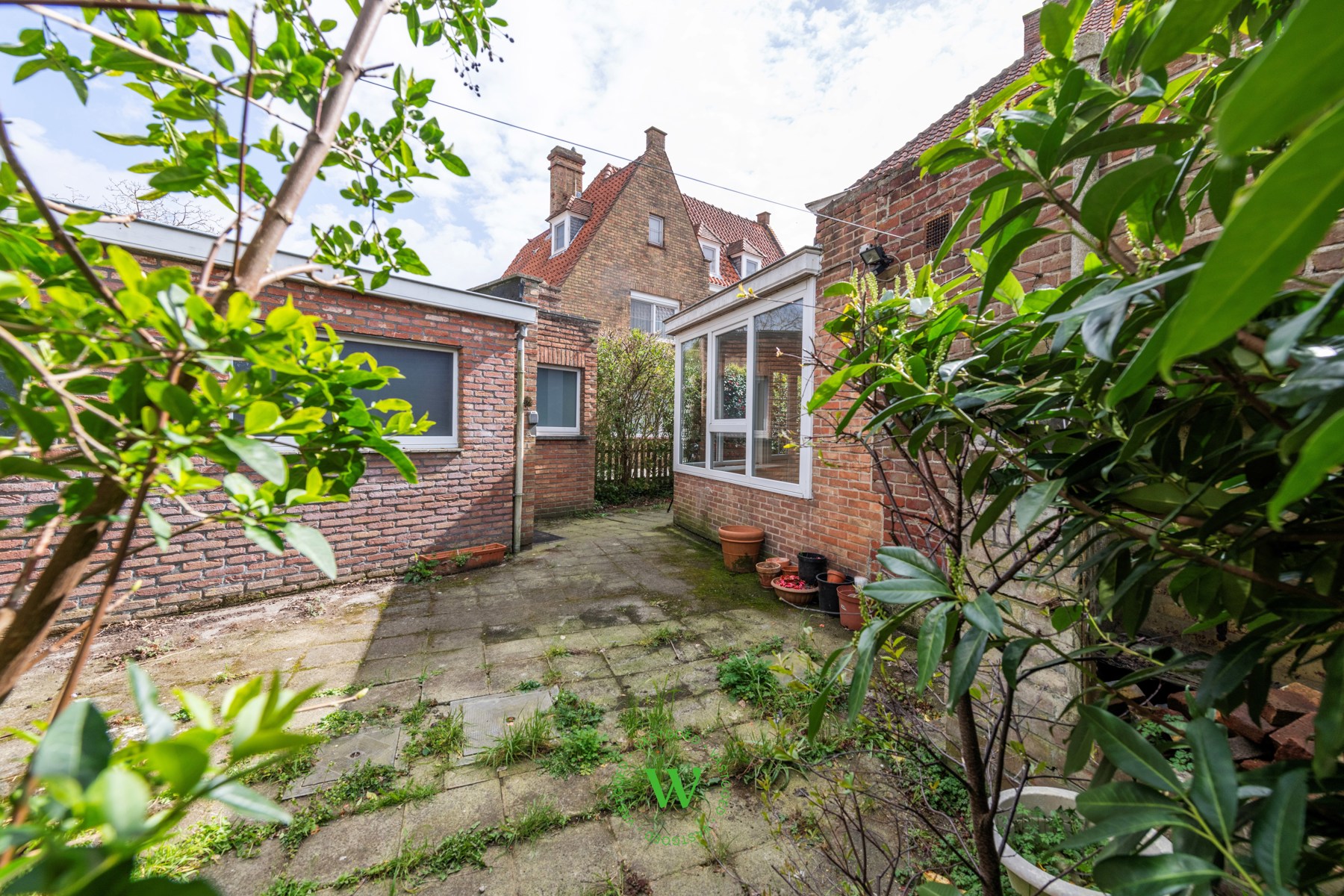 Verrassende en charmante halfopen bebouwing te Assebroek.