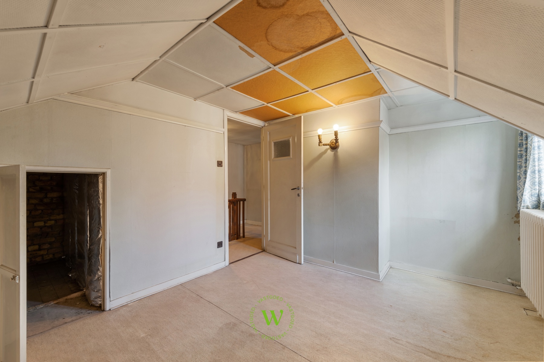 Verrassende en charmante halfopen bebouwing te Assebroek.