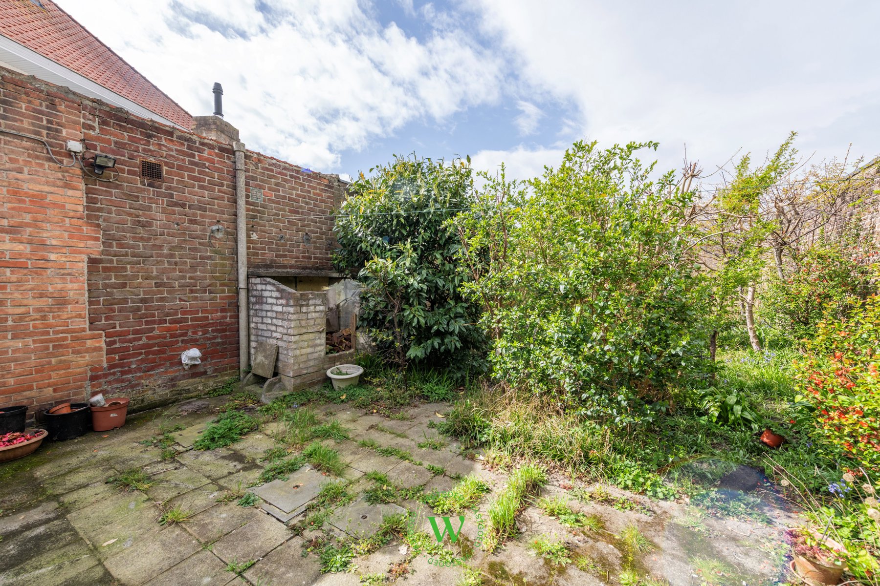 Verrassende en charmante halfopen bebouwing te Assebroek.