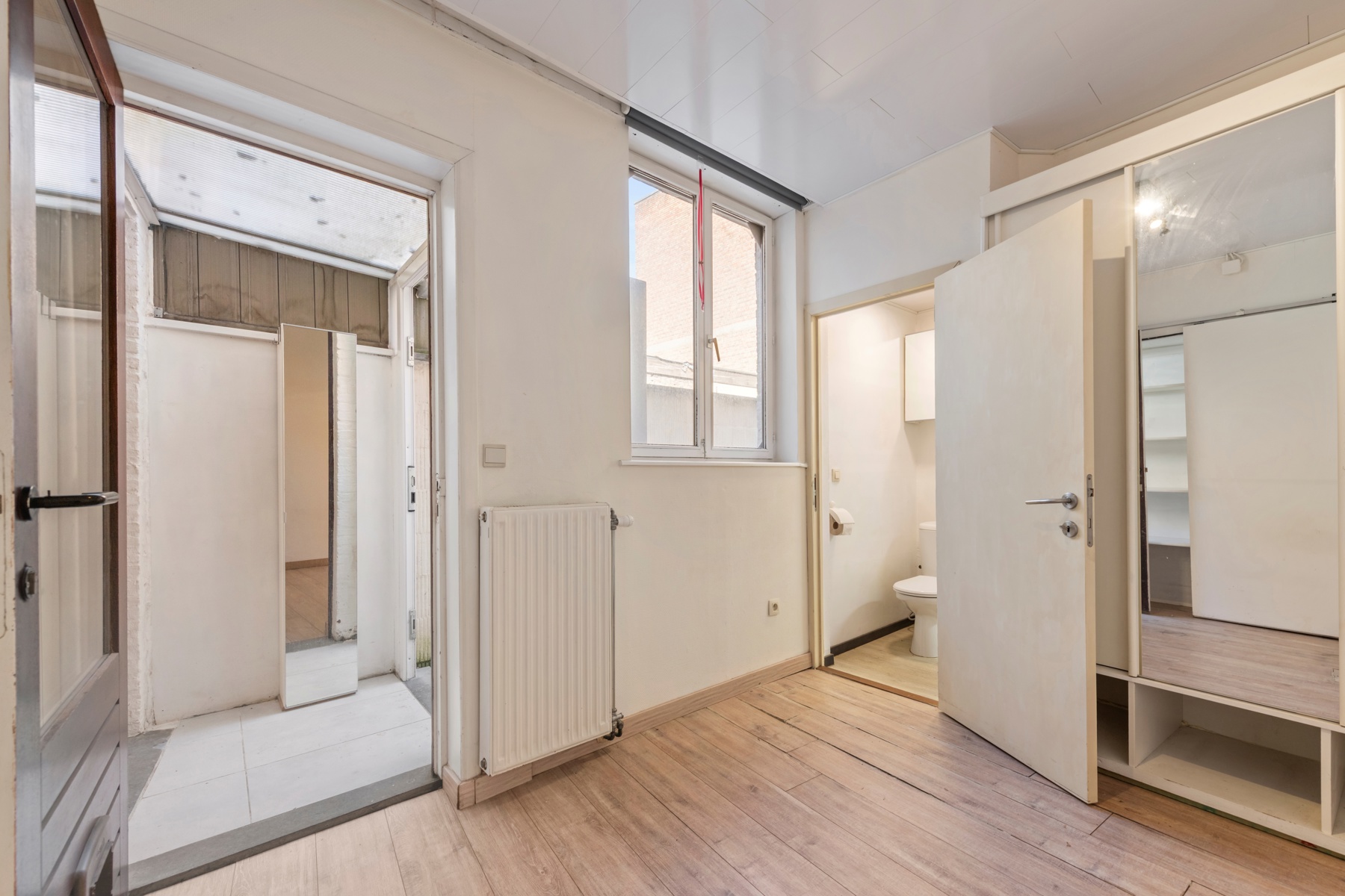 Centrum Brugge: opbrengsteigendom met 2 app. incl stadstuin.