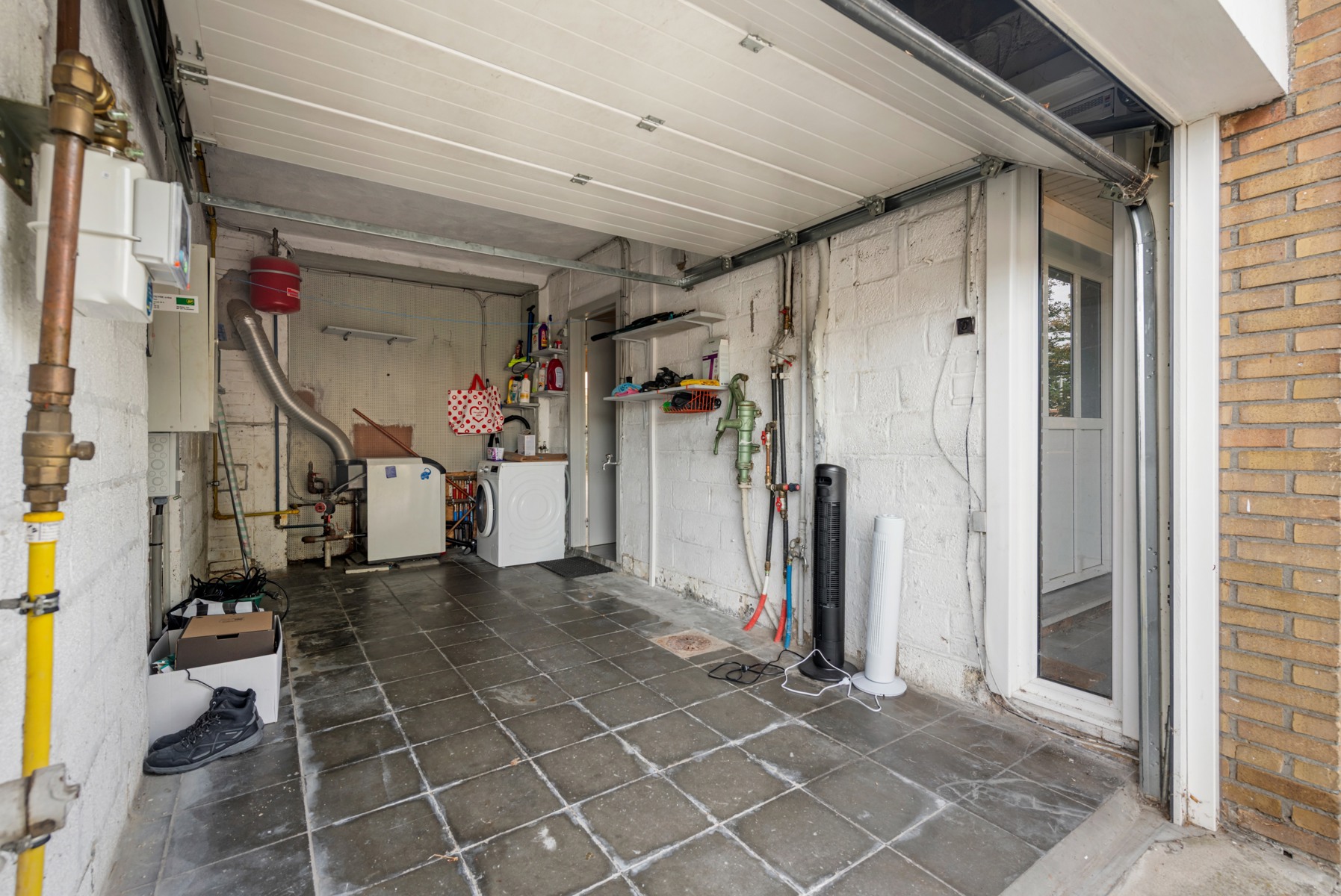 Gezinswoning met 4 slaapkamers, garage en oprit in Sint-Michiels