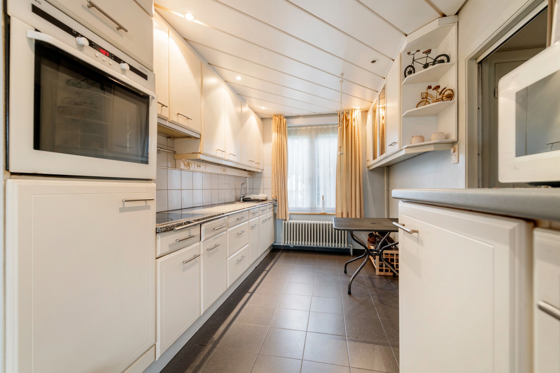 Gezinswoning met 4 slaapkamers, garage en oprit in Sint-Michiels