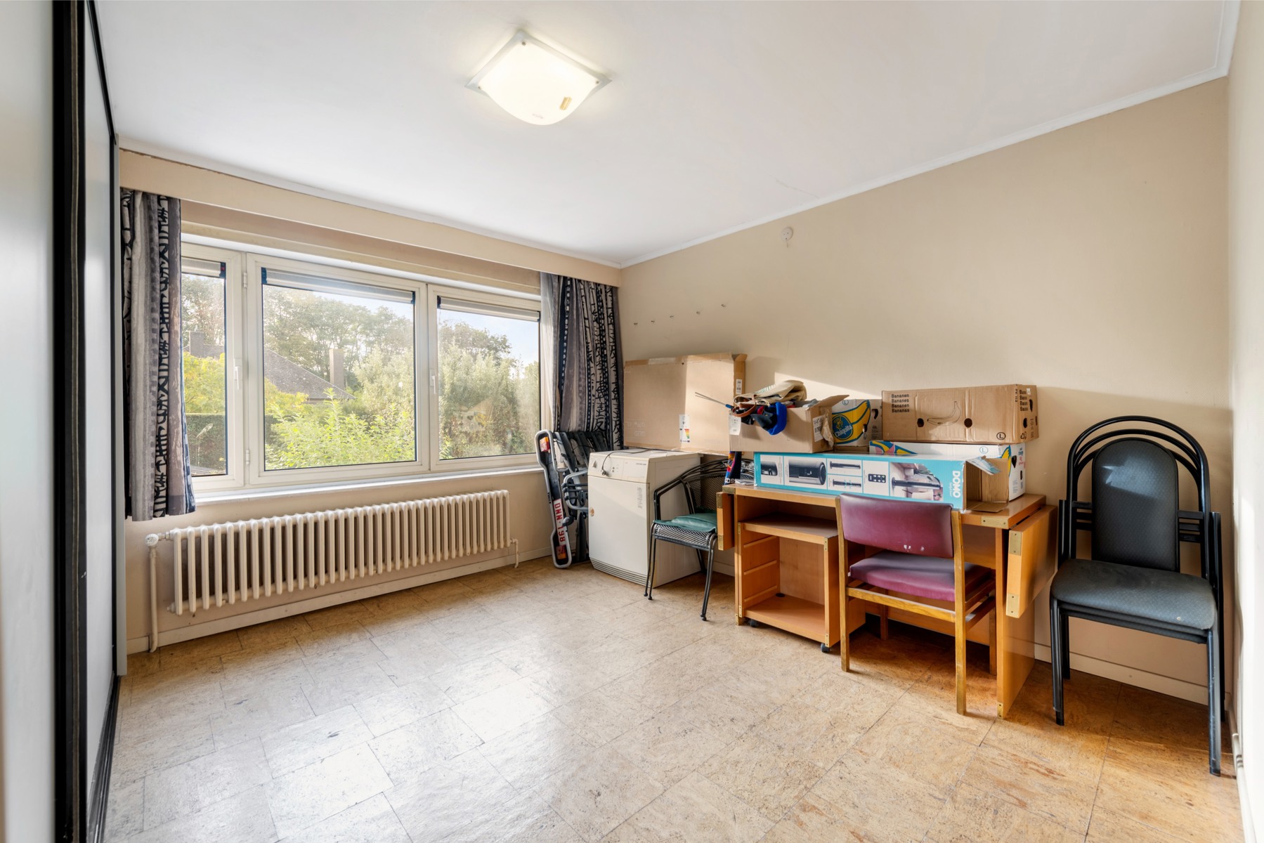 Gezinswoning met 4 slaapkamers, garage en oprit in Sint-Michiels